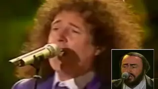 Freddie Mercury may have been the frontman of Queen, but it's Brian May's singing voice in a clip from 2003 that blows us away.