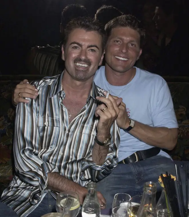 George Michael and partner Kenny Goss dated from 1996 to 2011. Pictured in 2002.