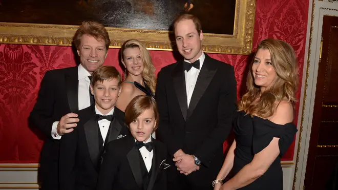 Prince William meets Jon Bon Jovi and wife Dorothea (right) with children (L-R) Jacob, Stephanie and Romeo in 2013