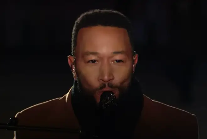 Wrapped up warm against the Washington D.C. chill, John Legend then made his way to sit at the piano and continued to sing while accompanied by of a large jazz band.