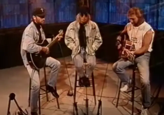 Bee Gees Barry, Robin and Maurice Gibb appeared on MTV's Most Wanted in 1993 and performed a stripped back version of their 1968 hit 'I Gotta Get A Message To You'.