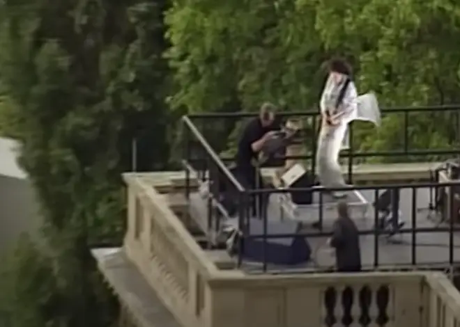 Brian May made his way all the way up through Buckingham Palace, out onto its roof and high among the battlements, for an extraordinary performance of 'God Save The Queen'.