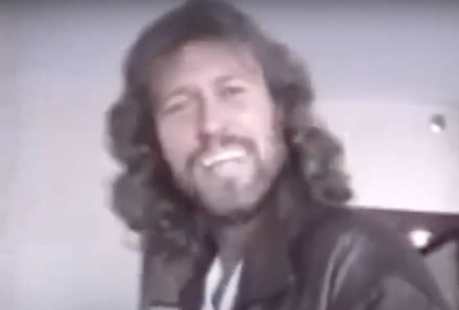 Barry Gibb impersonates a posh english man and makes jokes to amuse his son as he larks around in a homemade video recorded by his child in the 1980's.