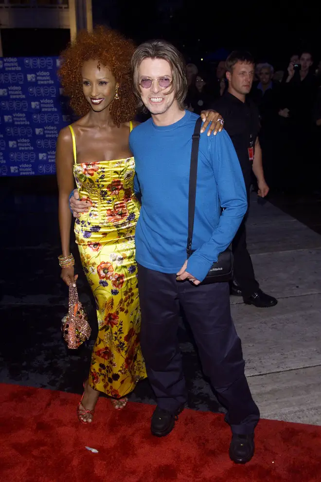 The interview has become an internet sensation, with fans keen to point out David Bowie's extraordinary prediction did indeed come true. Bowie pictured with wife Iman in 1999.