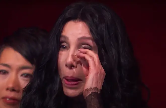 The Queen singer gave a heartfelt ballad-like performance of 'Believe' as the camera panned to a clearly moved Cher as she wiped away tears.