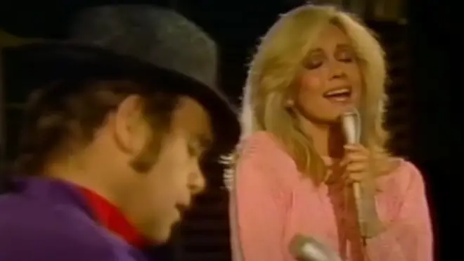 Elton John appeared on TV special Olivia Newton-John: Hollywood Nights when she invited him to come on stage and play a special version of his 1973 hit, 'Candle In The Wind.'