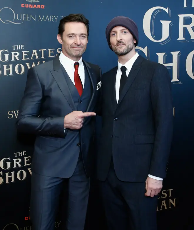 Michael Gracey (pictured right with Hugh Jackman) said he has spent hours talking to the singer about his life and wants to tackle the biopic in a way that hasn't been seen before.