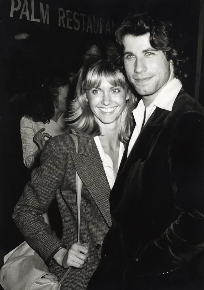 John Travolta and Olivia Newton-John pictured at dinner at the Palm Restaurant in Beverly Hills in April 1978