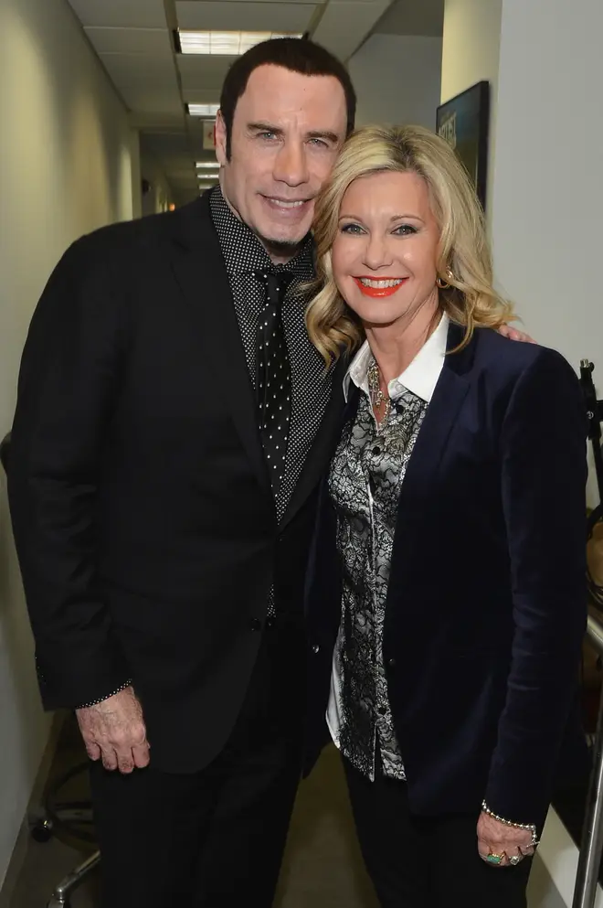 John Travolta and Olivia Newton-John pictured in New York on December 12, 2012