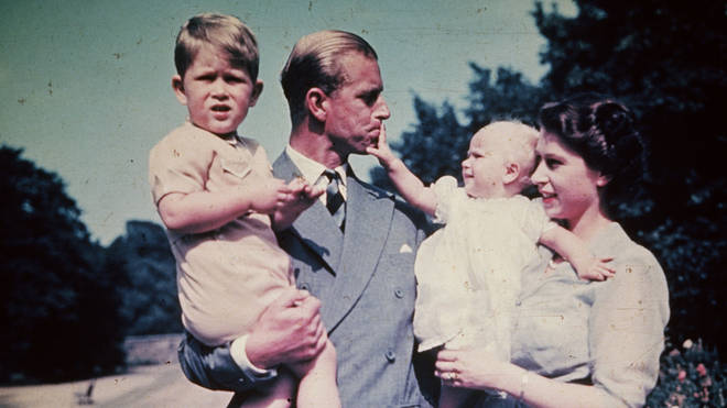 A young Prince Charles with Prince Philip and then-Princess Elizabeth in 1951