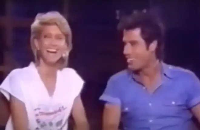 A video of Olivia Newton-John and John Travolta making eachother laugh hysterically has resurfaced online.
