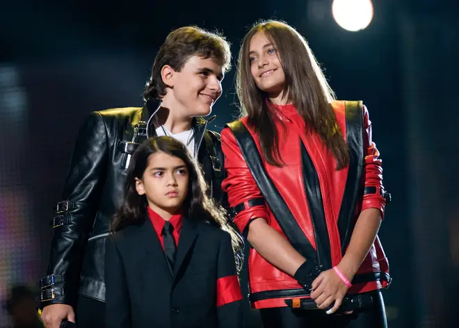 Prince Michael (left) has fond memories of growing up with his siblings, Paris (right) and Prince &squot;Blanket&squot; Jackson (bottom) in a house "filled with music".