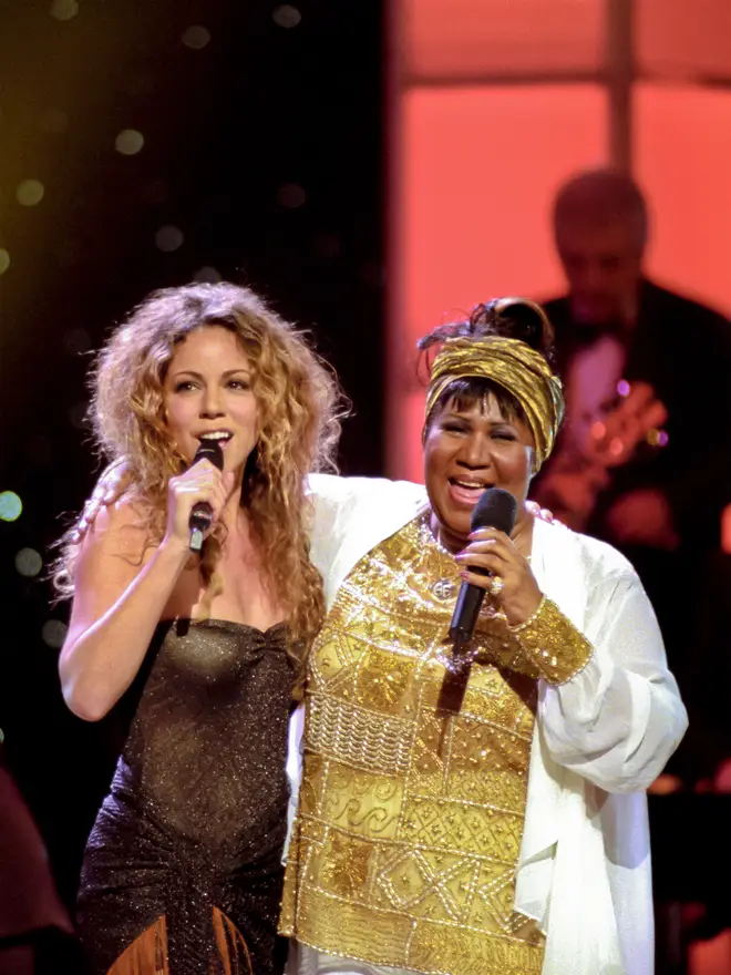 Mariah Carey (left) and Aretha Franklin perform onstage during the 'Divas Live--An Honors Concert for VH1 Save the Music' at the Beacon Theater, New York, New York, April 14, 1998.