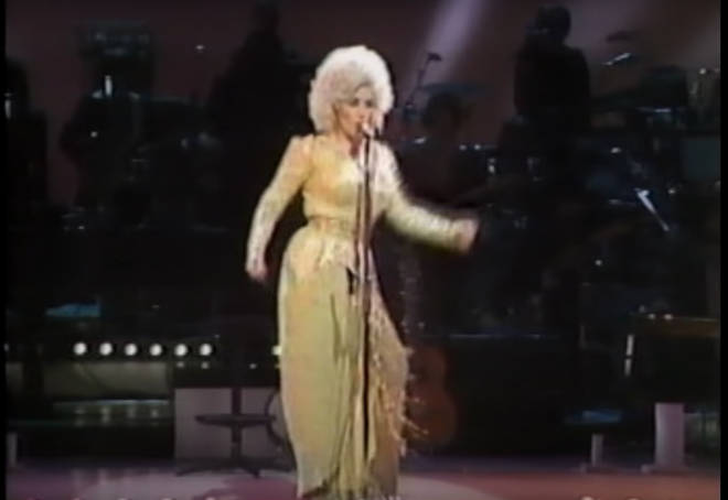 Dolly Parton did a hilarious impression of Elvis Presley by singing a brilliant cover of The King's 1957 hit, 'All Shook Up'.