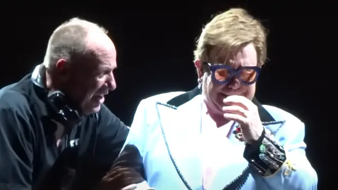 The brave moment Elton John tried to carry on performing after being diagnosed with 'walking pneumonia' was caught on camera in February 2020.
