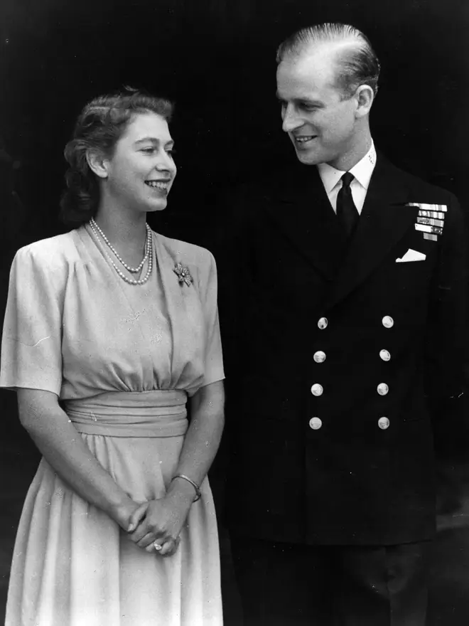 Philip was away fighting in the Second World War, yet the pair's love endured and their engagement was announced in July 1947 (pictured).