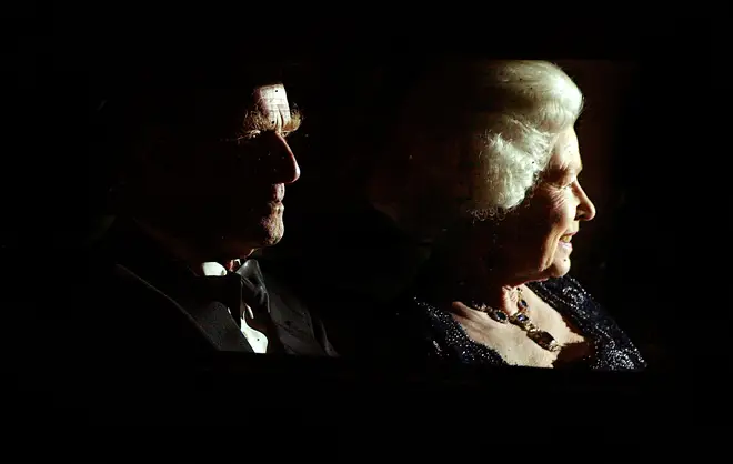 Queen Elizabeth and Prince Philip leave after attending The Queen's Party of Thanks at the Ritz Hotel November 14, 2002 in London.