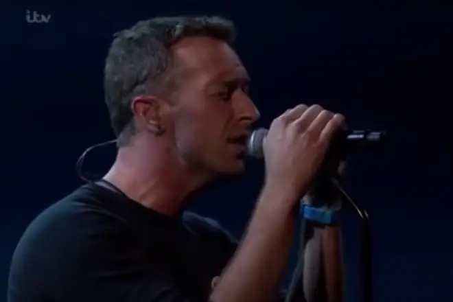 Chris Martin was introduced to the stage as of “the finest singer-songwriters of his generation."