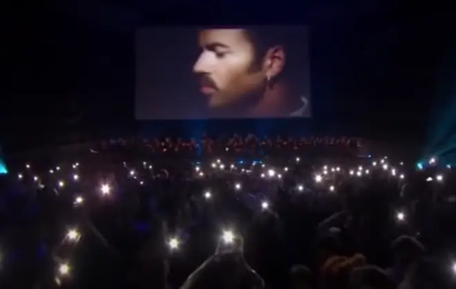 The night was infused with tributes and praise for George Michael's life, but no one was expecting the hauntingly beautiful moment George Michael himself would appear to perform on stage (pictured).