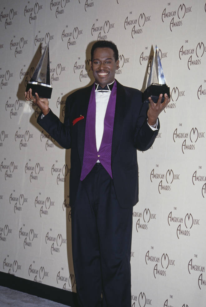 Luther Vandross started as a backing vocalist and co-wrote 'Fascination' for David Bowie, going on tour with him as a backing singer. Pictured winning American Music Awards for Favorite Soul/R&B Male Artist and Favorite Soul R&B Album in 1992.