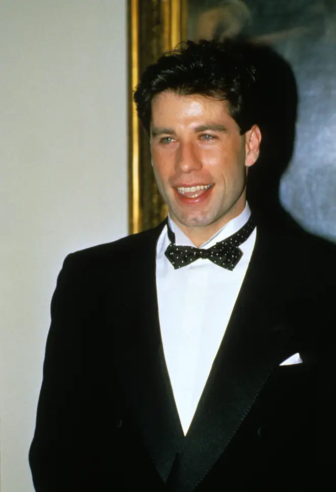 "Introducing myself to Diana in the proper way, conveying assurance, and asking her to be my dance partner was a complicated mission," John Travolta said. Pictured on the night in question at the White House in 1985.