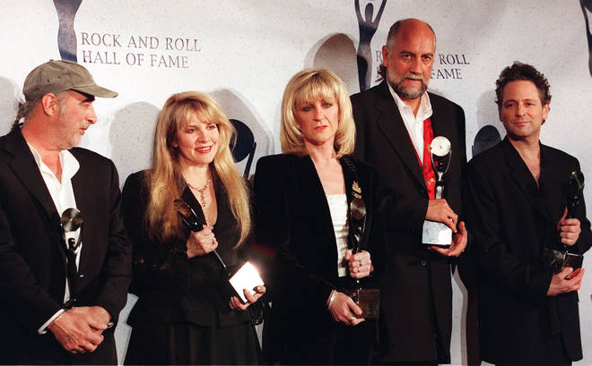 Mick Fleetwood has insisted that Fleetwood Mac are 'still together'. Pictured left to right: John McVie, Stevie Nicks, Christine McVie, Mick Fleetwood and Lindsay Buckingham