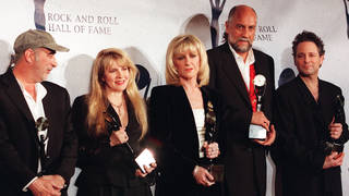 Mick Fleetwood has insisted that Fleetwood Mac are 'still together'. Pictured left to right: John McVie, Stevie Nicks, Christine McVie, Mick Fleetwood and Lindsay Buckingham
