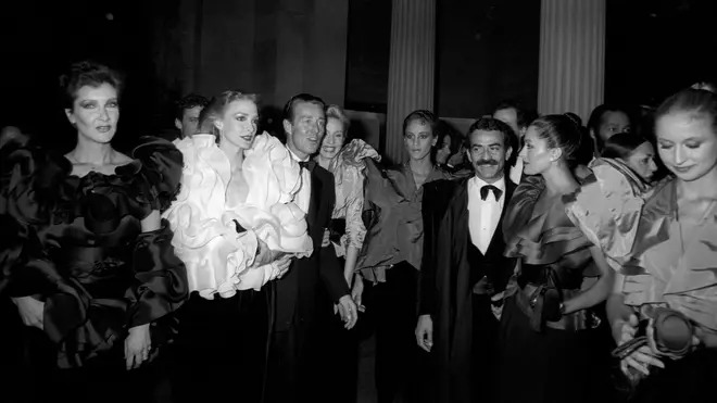Halston and partner Victor Hugo pictured with models at the New York Met