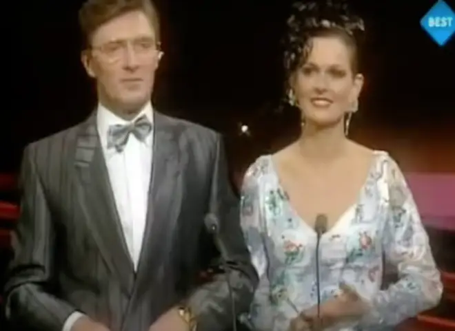 Eurovision presenters Pat Kenny and Michelle Rocca (pictured) struggled to keep the crowd calm as they realised Celine Dion had one the contest by one point.