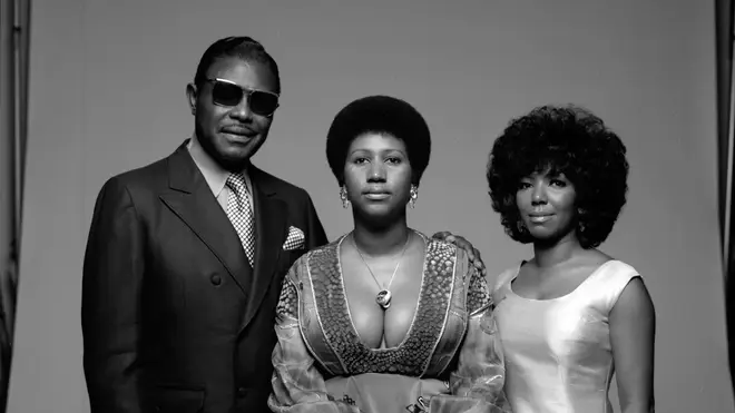 Aretha Franklin (centre) with her father CL and sister Erma (right)