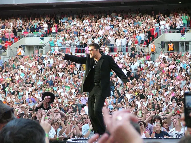 George Michael performs on stage on the final date of his two concerts at the new Wembley Stadium, on June 10th, 2007 in London