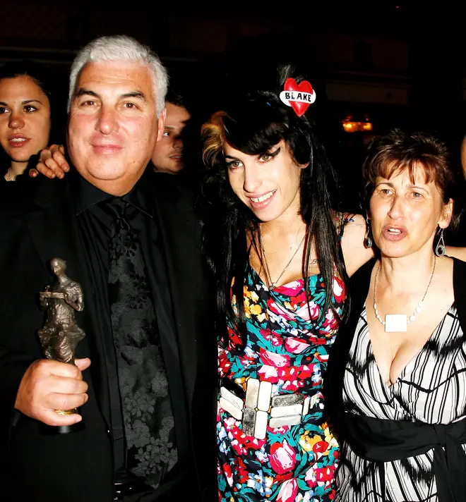 Amy Winehouse with her parents Mick and Janis in 2008
