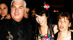 Amy Winehouse with her parents Mick and Janis in 2008