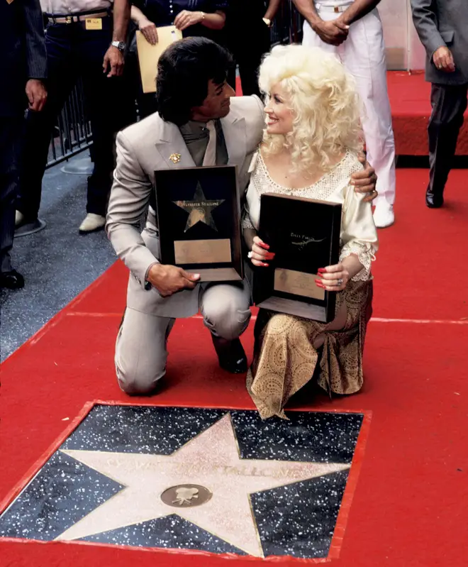 Dolly Parton and Sylvester Stallone are honoured with stars on the Hollywood Walk of Fame