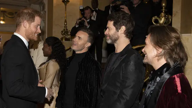 Harry with Take That