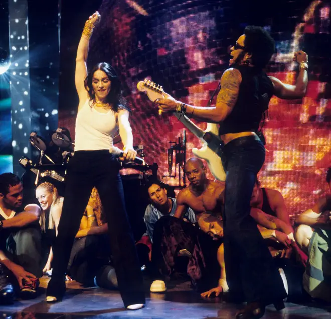 Madonna and Lenny Kravitz performing at MTV Video Music Awards in 1998. (Photo by Ke.Mazur/WireImage)
