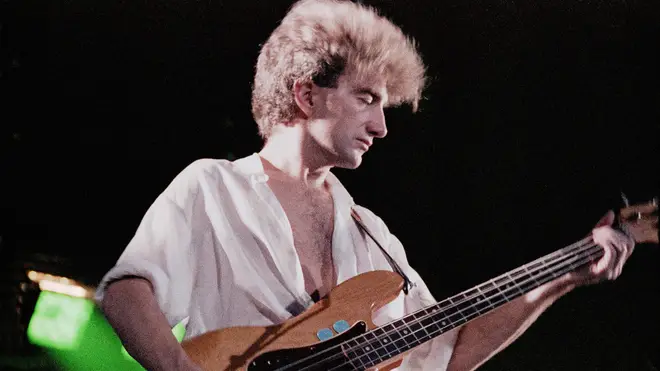Queen bassist John Deacon performing live on stage at Wembley Arena. (Photo by Phil Dent/Redferns)