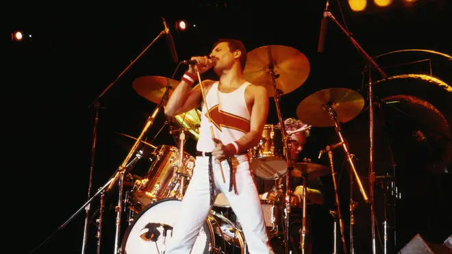 Freddie Mercury on stage during a live concert at the National Bowl in Milton Keynes, 1982. (Photo by Fox Photos/Hulton Archive/Getty Images)