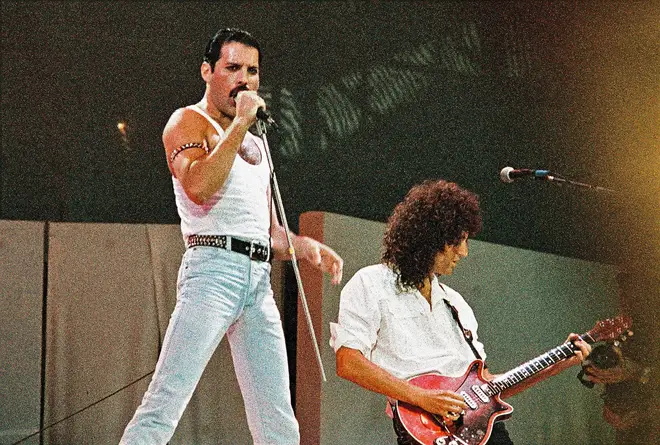 Queen's Freddie Mercury and Brian May during their legendary Live Aid set at Wembley Stadium on July 13th, 1985. (Photo by Pete Still/Redferns)