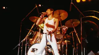 Freddie Mercury performs with Queen