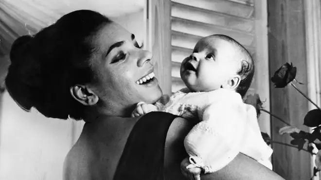 Shirley Bassey holding her daughter Samantha at 10-weeks old. (Photo by Daily Express/Archive Photos/Hulton Archive/Getty Images)