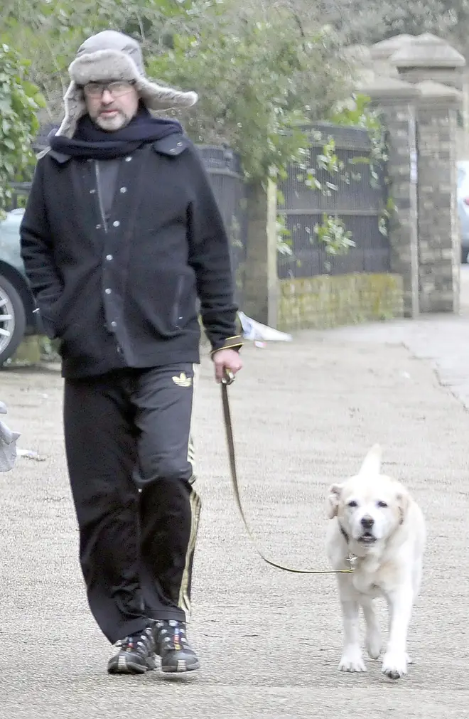 George Michael walking his Labrador