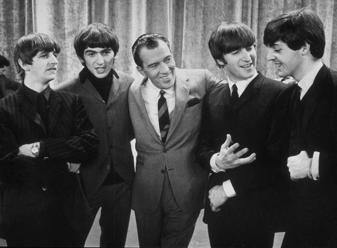 The Beatles on The Ed Sullivan show in 1964. (Photo by Express Newspapers/Getty Images)