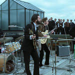 The Beatles performing on the Apple rooftop
