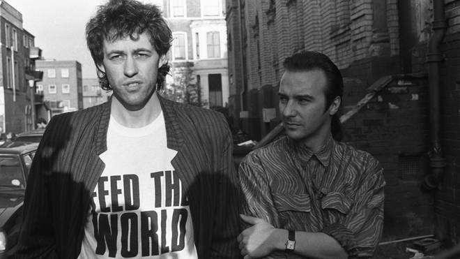 Bob Geldof and Midge Ure pictured outside SARM Studios in Notting Hill, London, during the recording of the Band Aid single 'Do They Know It's Christmas?' in 1984. (Photo by Larry Ellis/Express Newspapers/Getty Images)