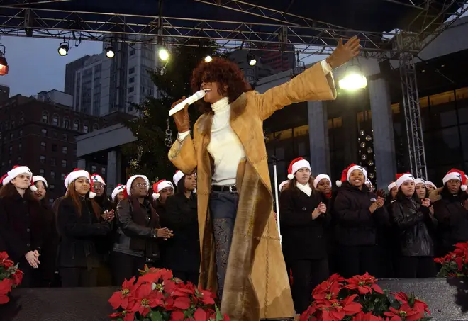 Whitney famously adored Christmas and wanted to spread as much festive joy as she possibly could. (Photo by KMazur/WireImage)