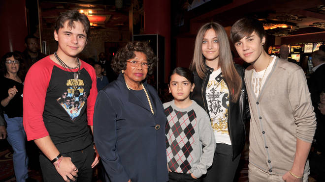 Katherine Jackson with grandchildren Prince, Blanket and Paris, and singer Justin Bieber