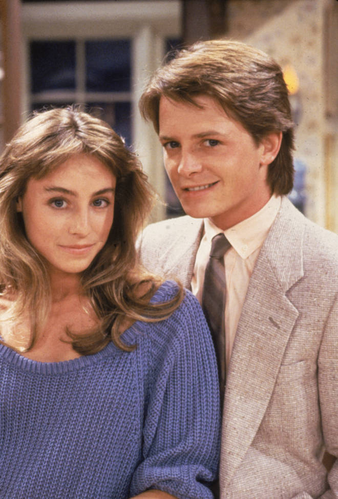 Michael J. Fox and Tracy Pollan on the set of Family Ties together in 1986. (Photo by Universal Studios/Getty Images)