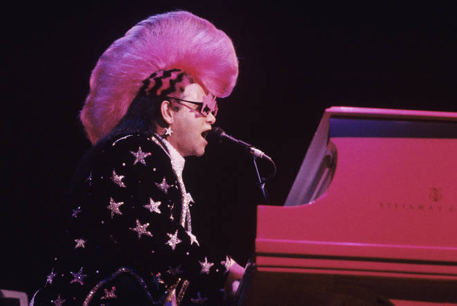 Elton John performing at Madison Square Garden in New York City on September 11, 1986. (Photo by Ebet Roberts/Redferns)