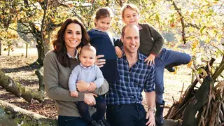 Prince William, the Duchess of Cambridge and their three children Prince George, Princess Charlotte and Prince Louis pose amongst the autumn leaves